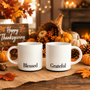 Black 'Blessed' and 'Grateful' typography, displayed as festive fall and Halloween decor surrounded by pumpkins, autumn leaves, and a rustic cornucopia.